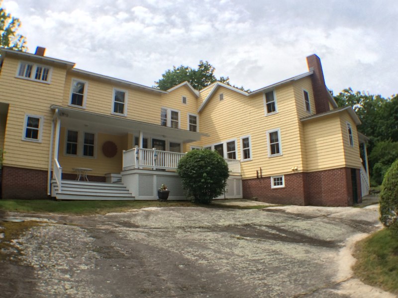 Back of house after renovation and new brick foundation